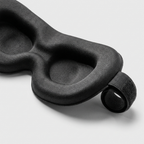 NOXFORM BLACKOUT sleep mask, close-up of contoured eye cups and adjustable strap